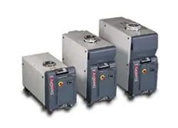 A group of four industrial type heaters.